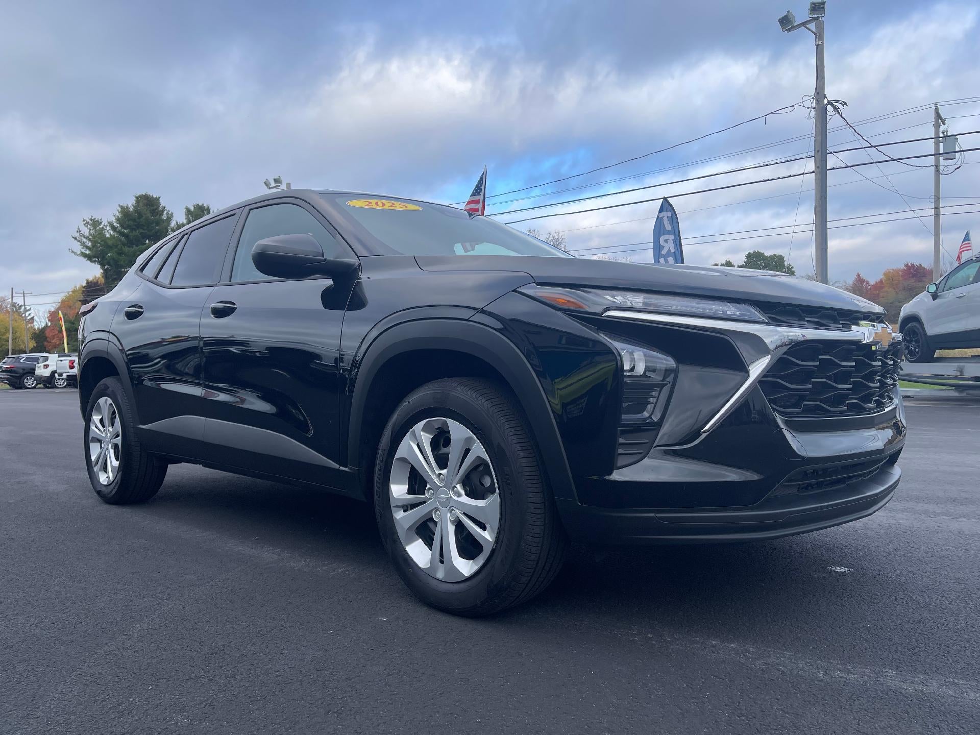 2025 Chevrolet Trax LS in Mosaic Black Metallic — front three-quarter view